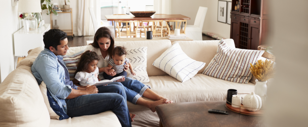 Family sitting together on a couch